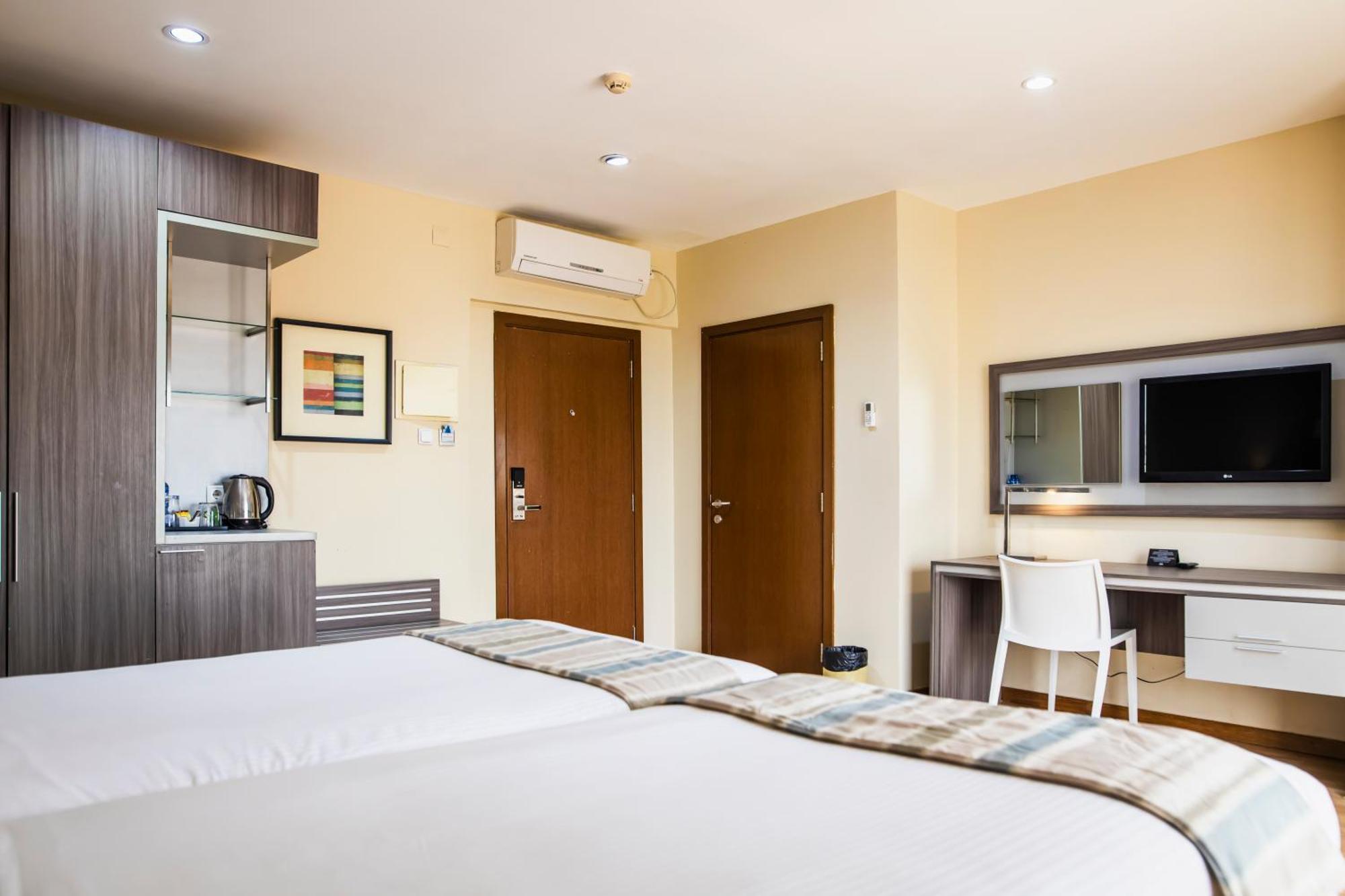 Quarto Deluxe com 2 Camas de Solteiro